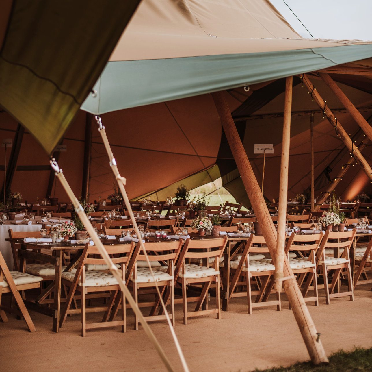 Wedding tables inside a tipi